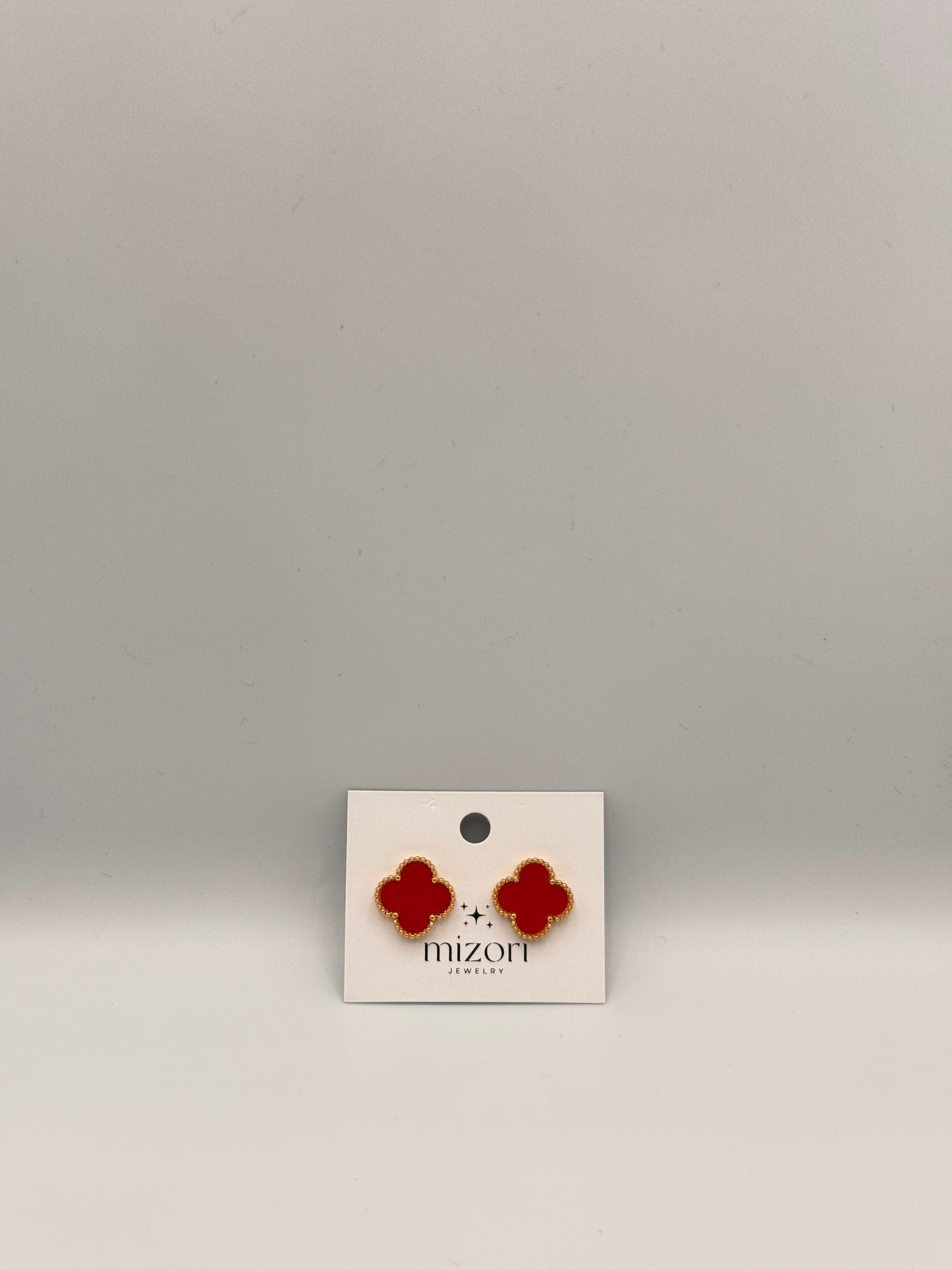 Mizori Jewelry red and gold stainless steel clover earrings, elegant minimalist women’s fashion accessory.